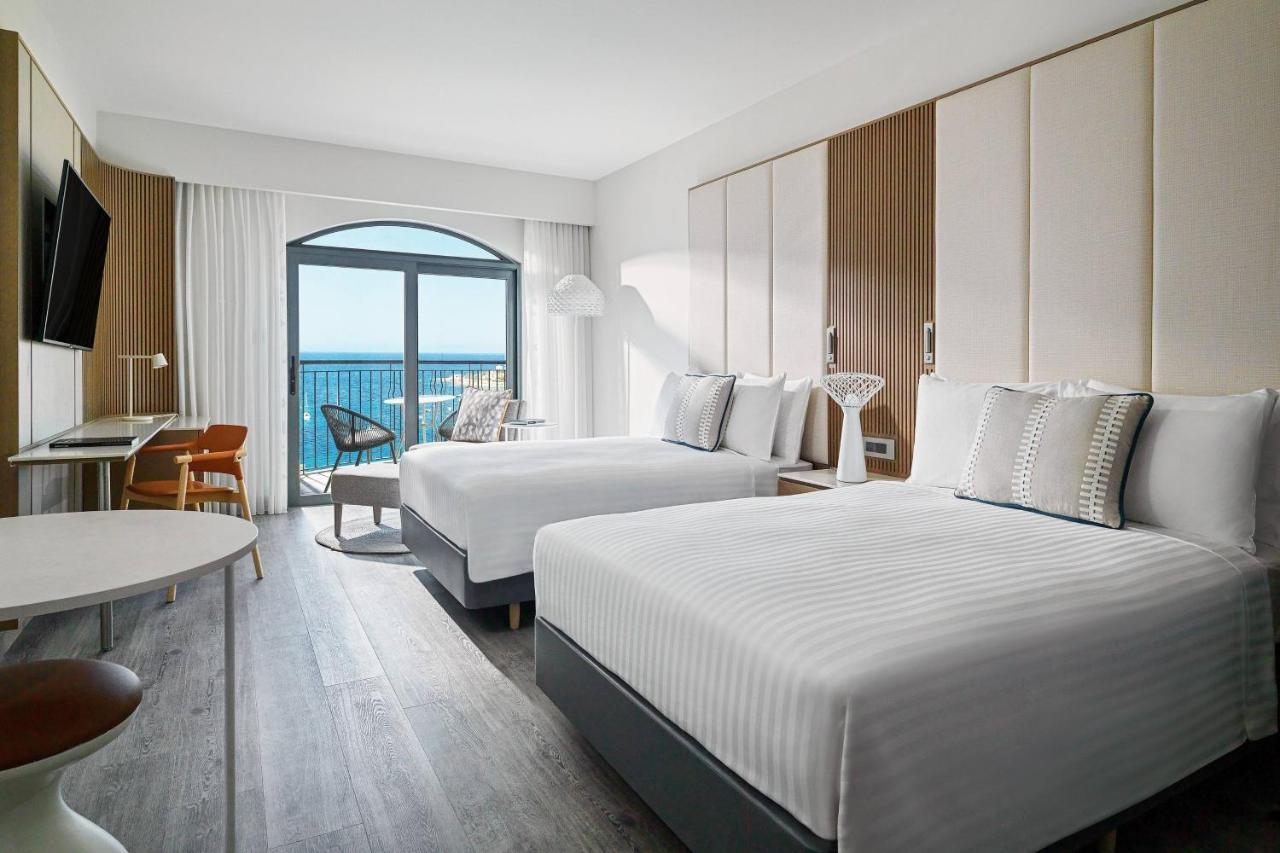 Malta Marriott Resort & Spa Saint Julian's Exterior photo A guest room at the Hilton Garden Inn